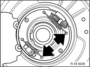 Disconnect return springs with brake spring pliers

